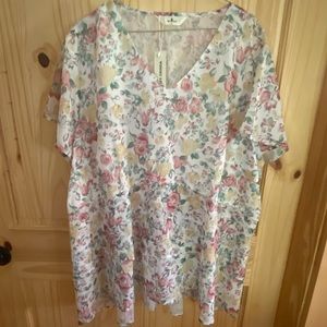 Floral blouse, a little fitted at waist to allow for the flow at bottom